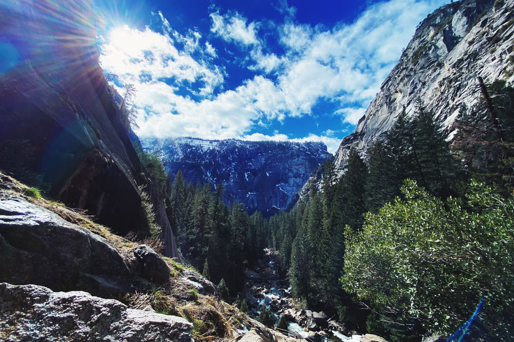 Granite cliffs, pines, and a creek in the Sierra Nevada near Mariposa